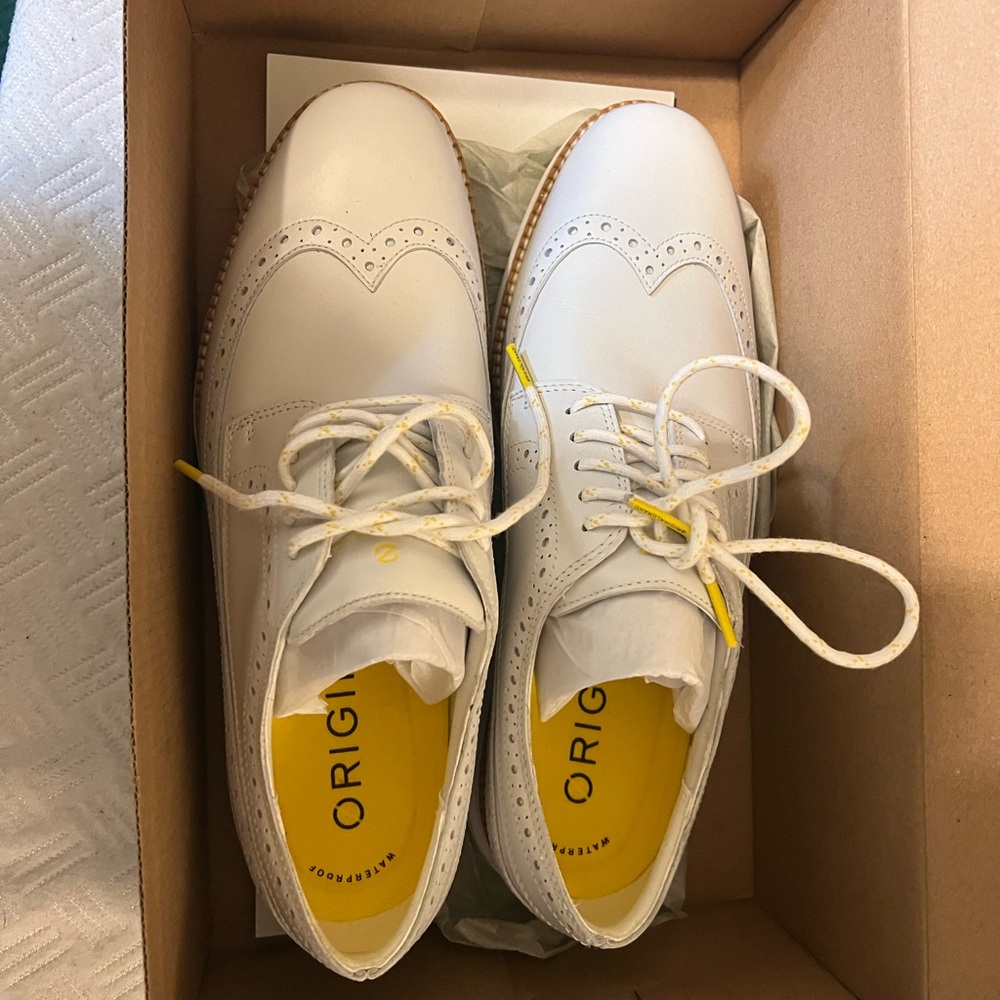 Cole Haan, brand new. White. Size 9, waterproof
